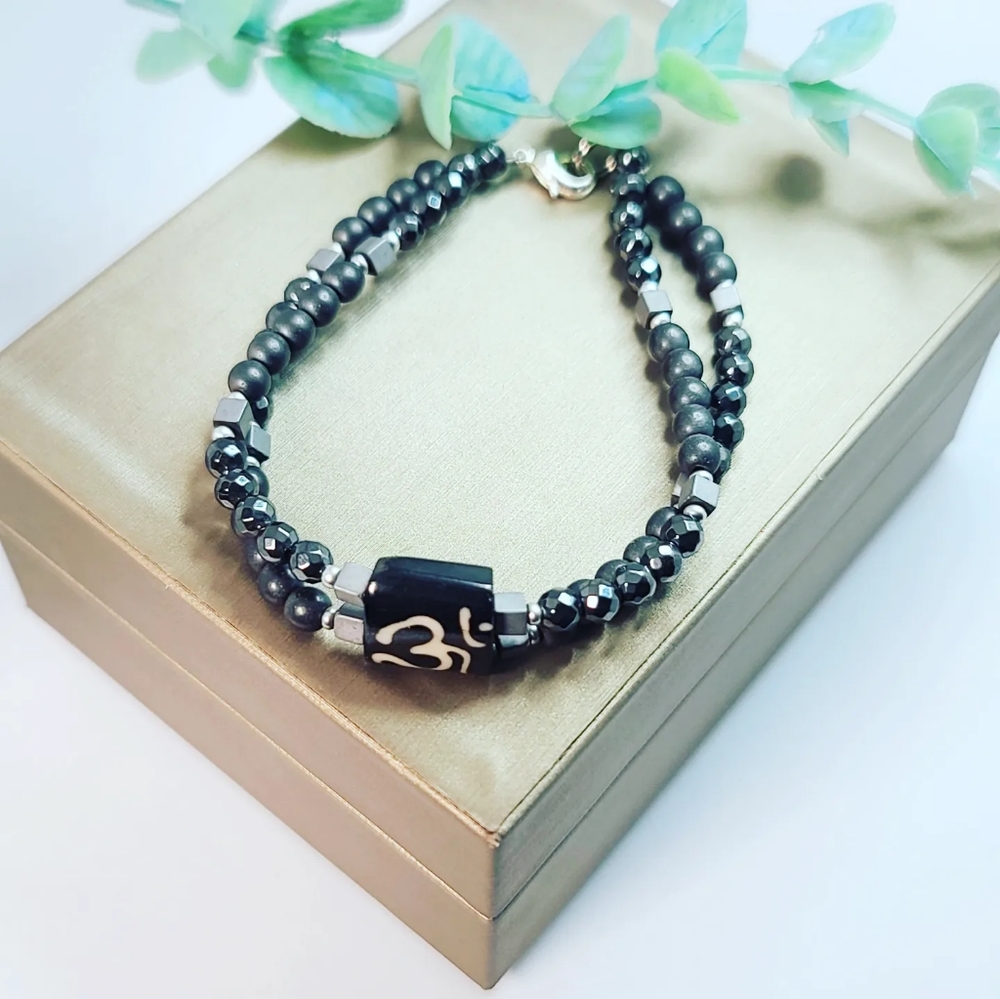 Hematite Om bracelet 4 mm